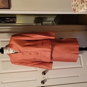 Le Suit ladies suit, beautiful pumpkin shade.